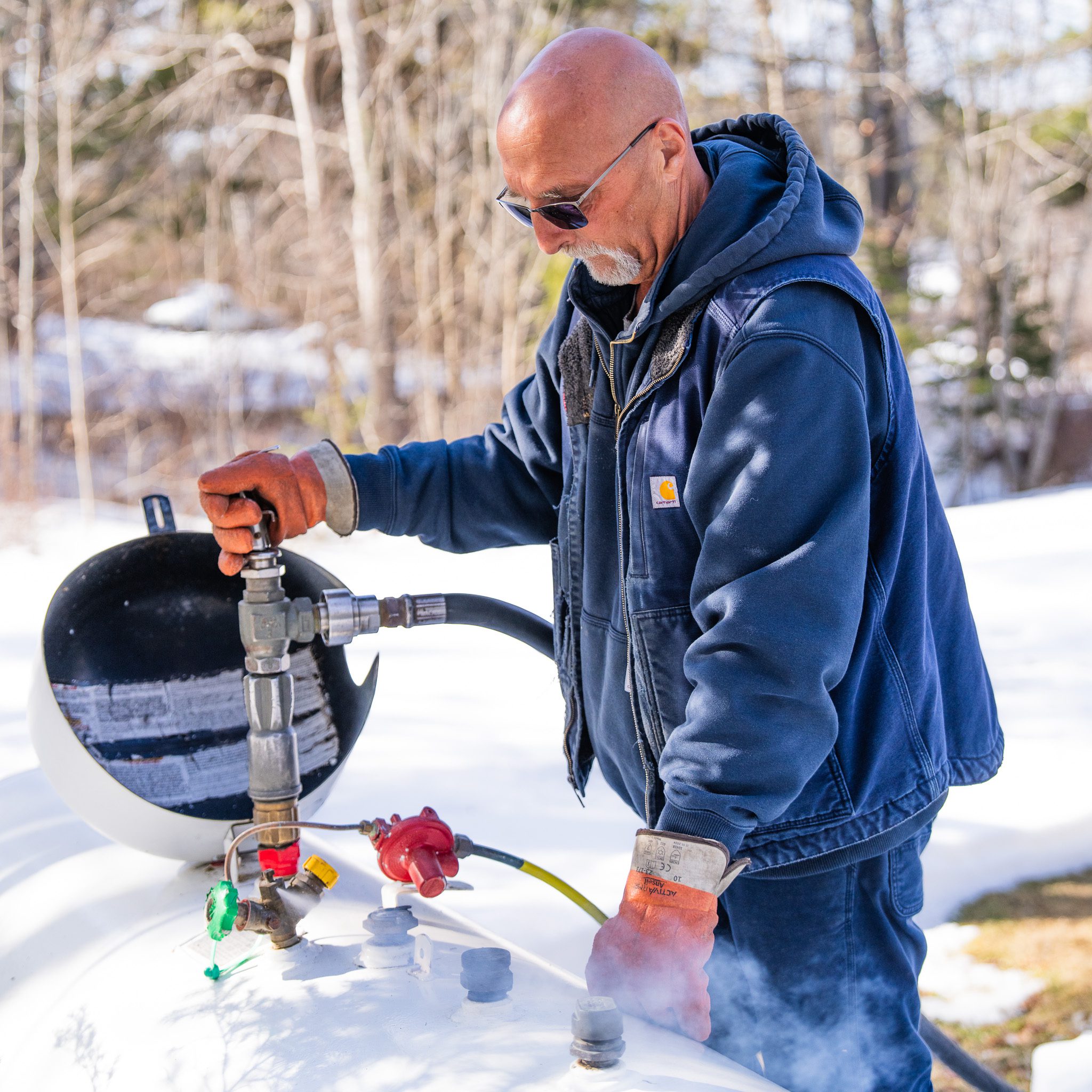 Propane: The versatile, efficient energy solution for your coastal home. M.W. Sewall propane delivery driver Dan providing reliable fuel service in Midcoast Maine.