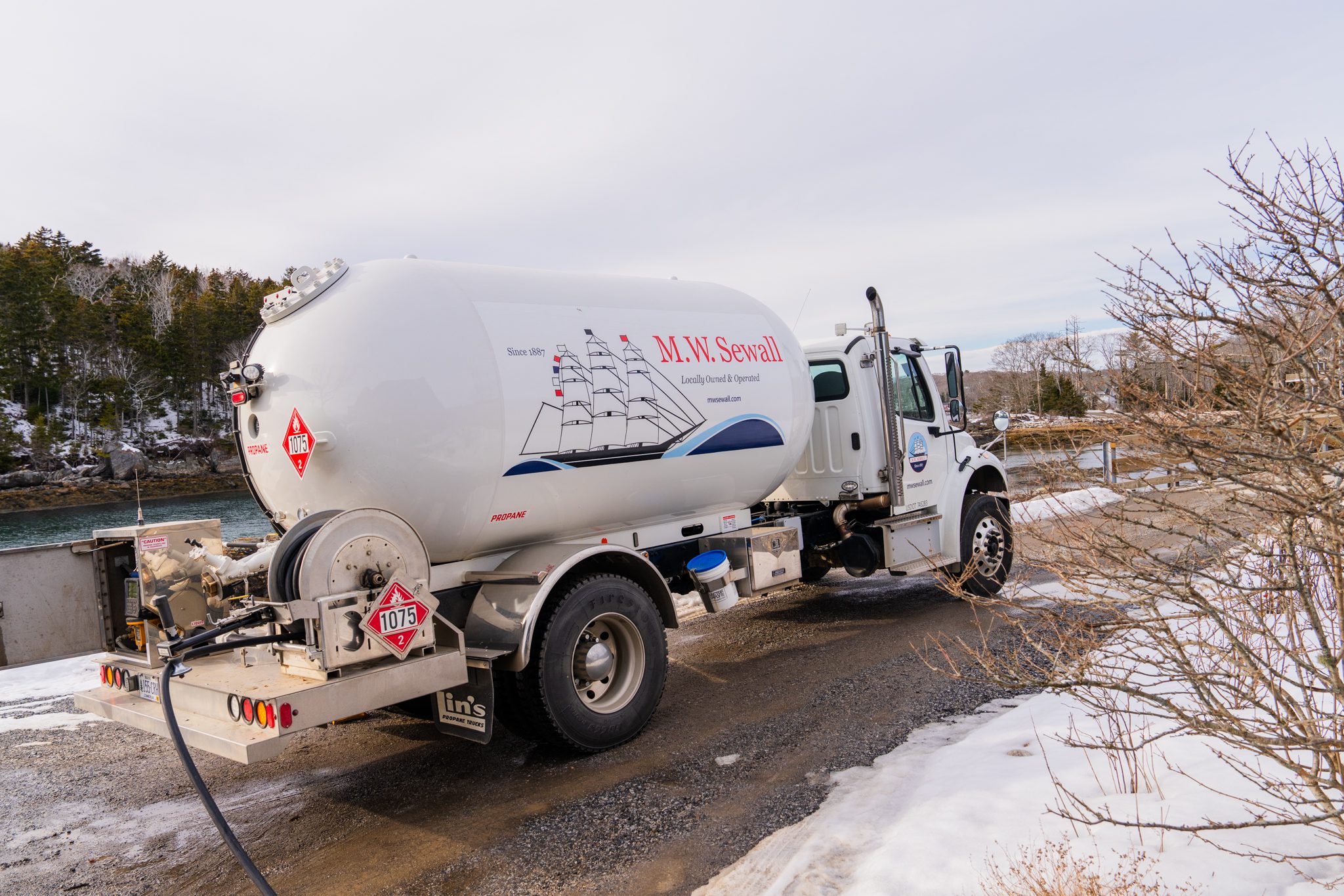 propane-truck-mwsewall-2 A M.W. Sewall propane truck in driveway of customer in Midcoast Maine.