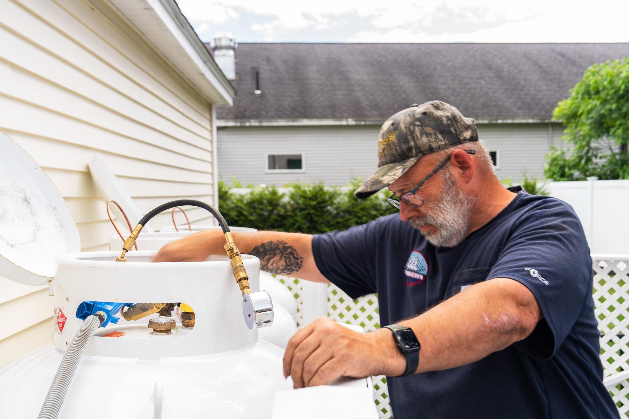 Steve-mw-sewall-technician Service Technician, Steve installing a new propane tank.